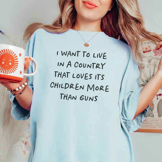 I Want to Live in a Country that Values it's Children More Than Guns T-Shirt