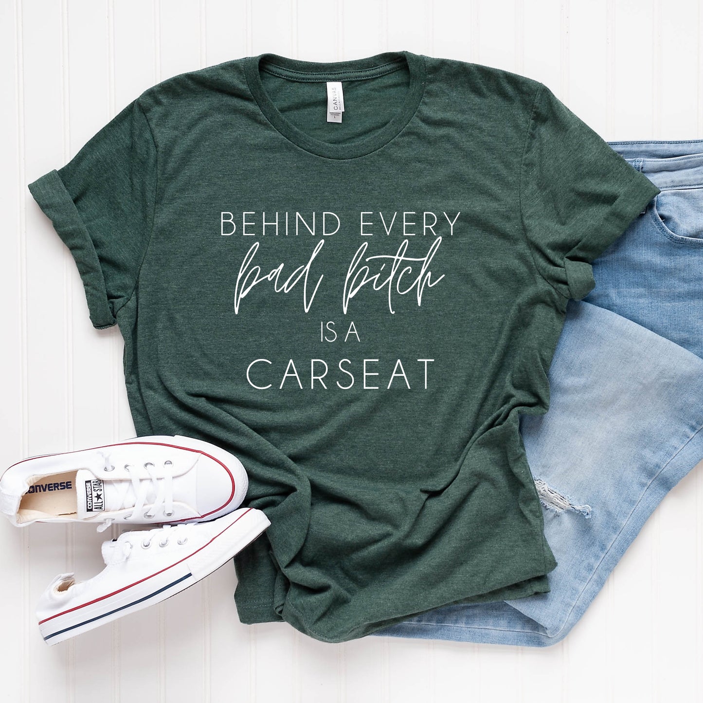 Behind Every Bad Bitch is a Car Seat  T-Shirt