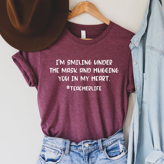 I'm Smiling Under The Mask Teacher T-Shirt